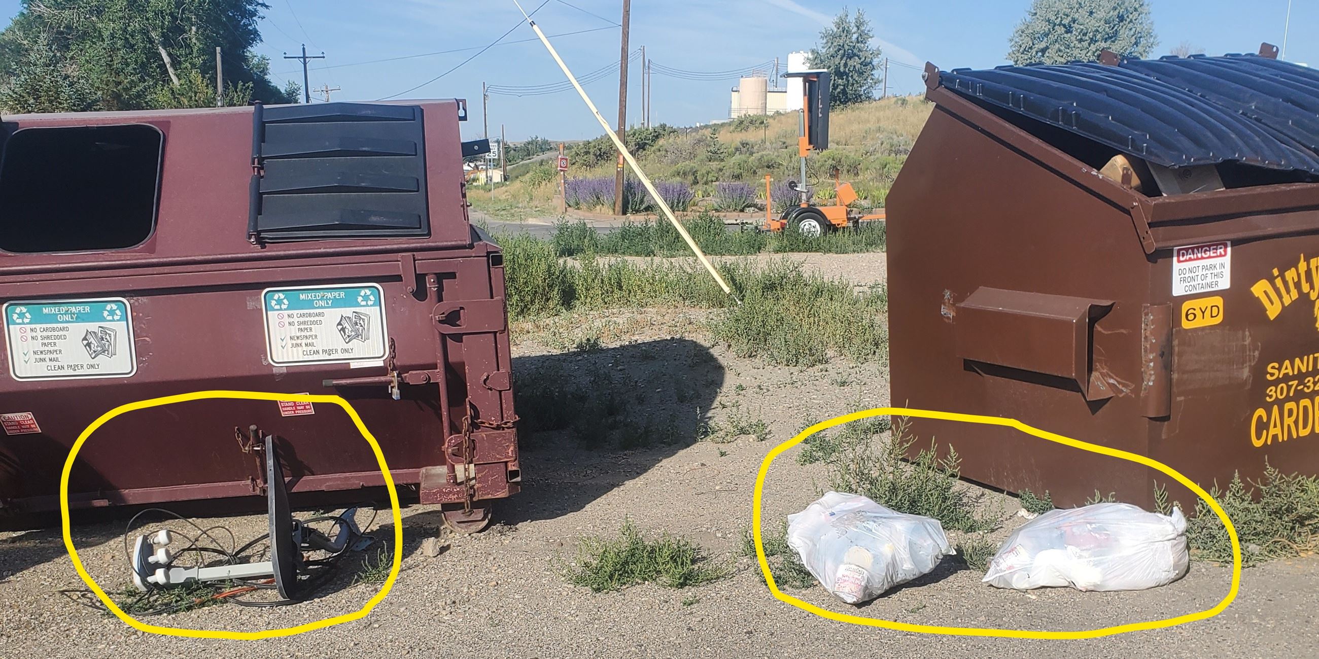 Inked  -  trash at drop off bins