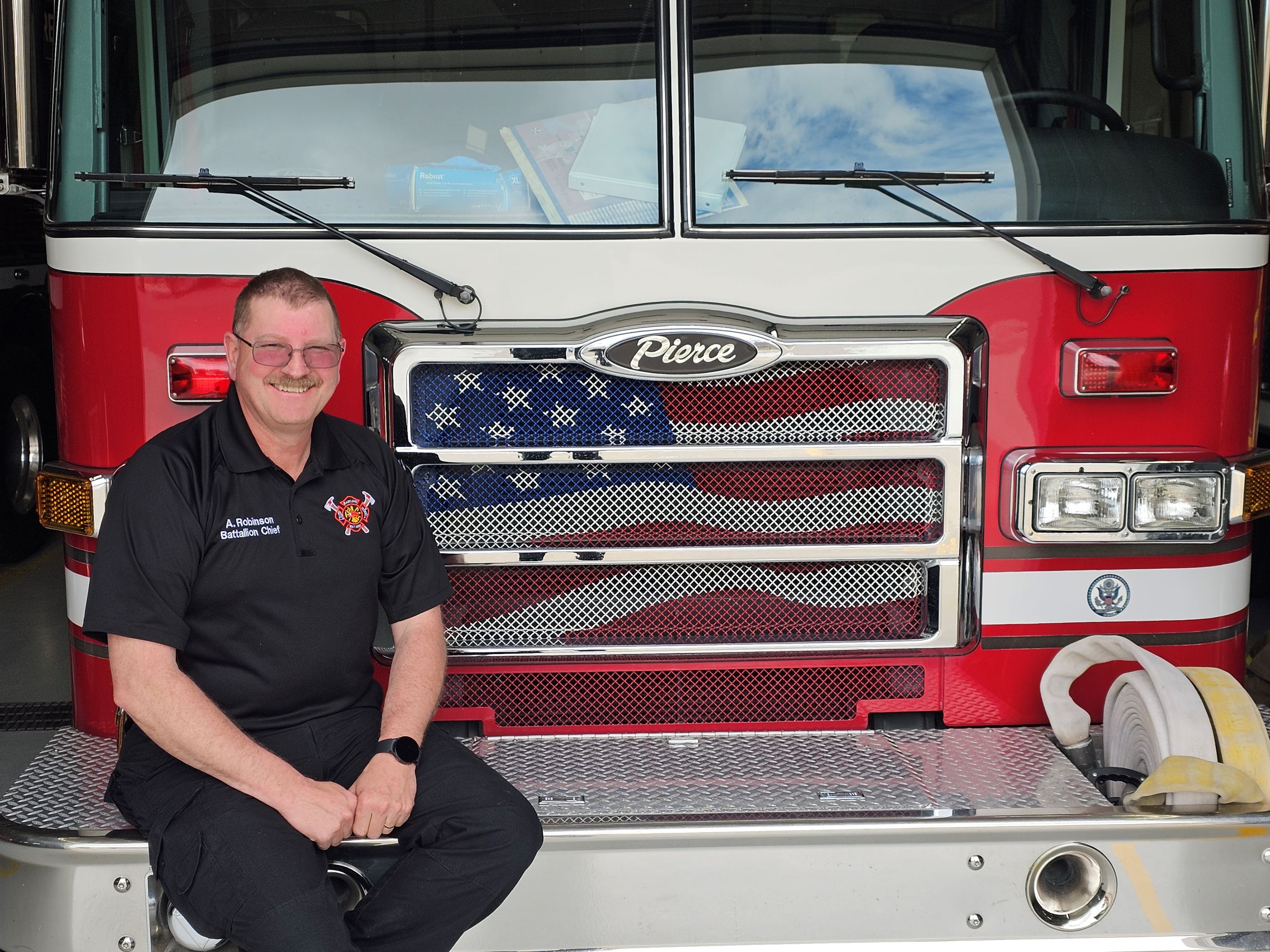 Allen Robinson sits with Fire Truck